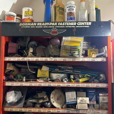 Orange metal shelf with everything on it