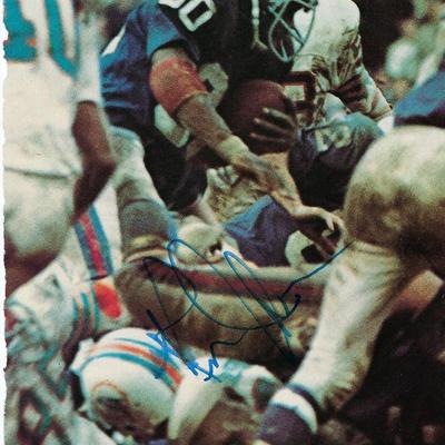 John Tuggle signed magazine photo