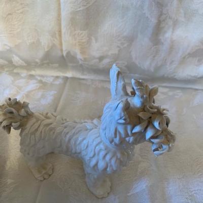 Pair of spaghetti porcelain dogs