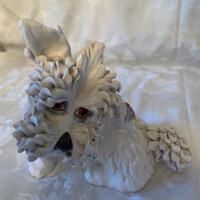 Pair of spaghetti porcelain dogs