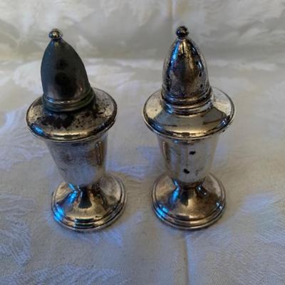 Vintage crown sterling weighted salt and pepper shakers