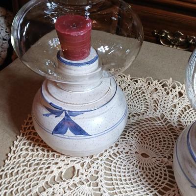 Pair of Signed Pottery / stoneware hurricane candle with glass globes