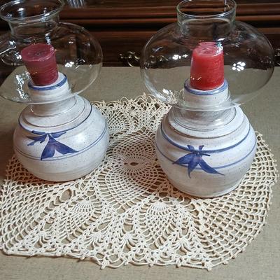 Pair of Signed Pottery / stoneware hurricane candle with glass globes