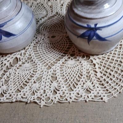 Pair of Signed Pottery / stoneware hurricane candle with glass globes
