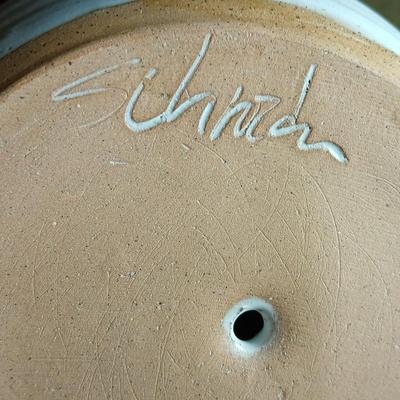 Pair of Signed Pottery / stoneware hurricane candle with glass globes