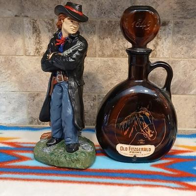 Cowboy ceramic Art Statue and Vintage Old Fitzgerald whisky bottle with horse