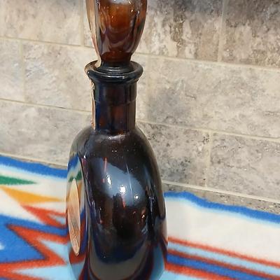 Cowboy ceramic Art Statue and Vintage Old Fitzgerald whisky bottle with horse