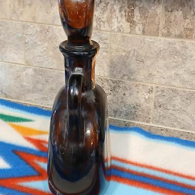 Cowboy ceramic Art Statue and Vintage Old Fitzgerald whisky bottle with horse