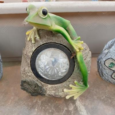 Small Fairy Garden in a pot with two faux decorative rocks and a Solar frog light