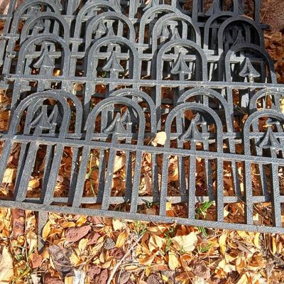 9 black connecting plastic fence pieces with a large flowerpot