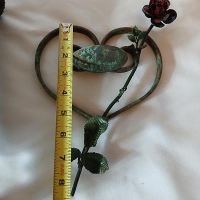 Beautiful tin vase with rose and hanging iron heart with rose candle holder