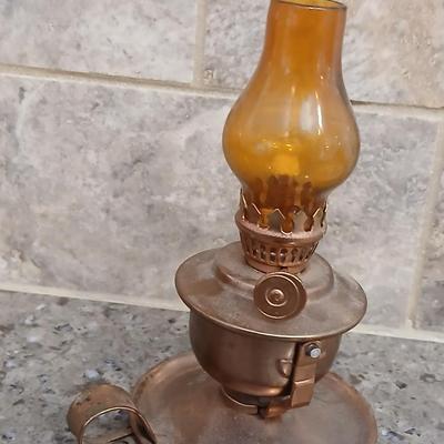 Two miniature oil lanterns with a knit Doiley - lanterns will really work with added oil!