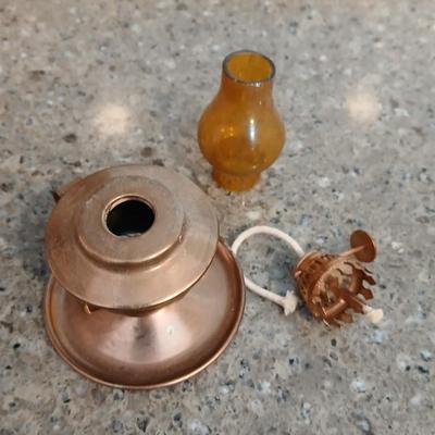 Two miniature oil lanterns with a knit Doiley - lanterns will really work with added oil!