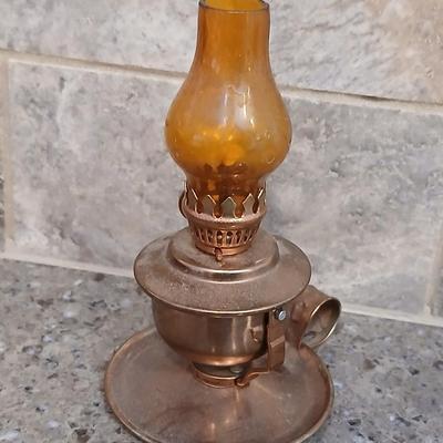Two miniature oil lanterns with a knit Doiley - lanterns will really work with added oil!