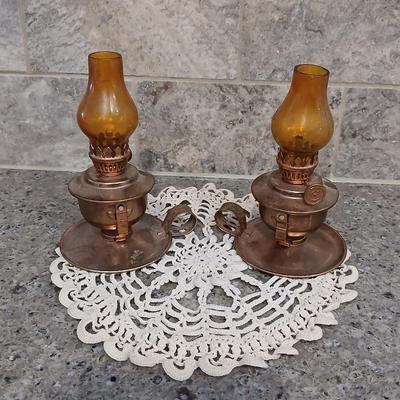 Two miniature oil lanterns with a knit Doiley - lanterns will really work with added oil!