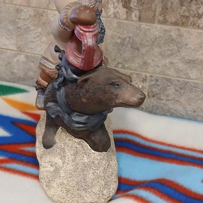 Grizzley bear Santa with lantern ceramic art statue