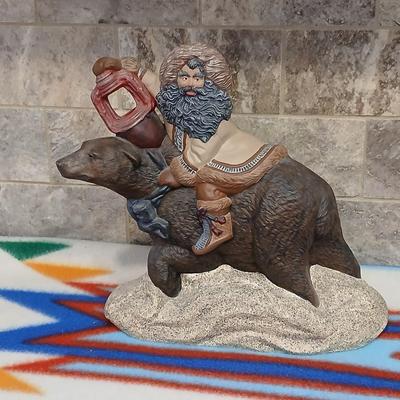 Grizzley bear Santa with lantern ceramic art statue