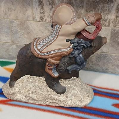 Grizzley bear Santa with lantern ceramic art statue