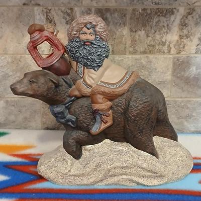 Grizzley bear Santa with lantern ceramic art statue