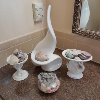Abstract ceramic art sculpture with swan soap dish and other ceramic pieces with seashell collection