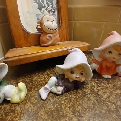 Collection of Homeco Pixie Elves a monkey bank and a unicorn mirrored wall shelf