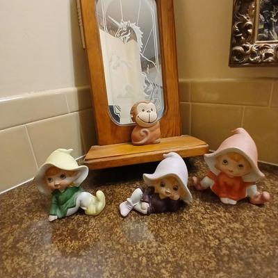 Collection of Homeco Pixie Elves a monkey bank and a unicorn mirrored wall shelf