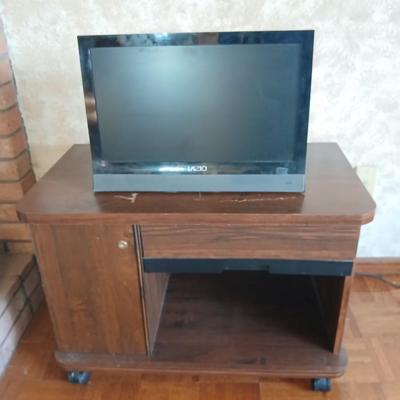 Working 19" Vizio Television with small media storage stand
