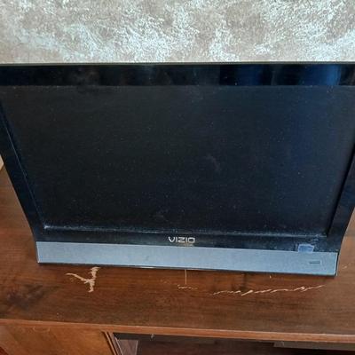 Working 19" Vizio Television with small media storage stand