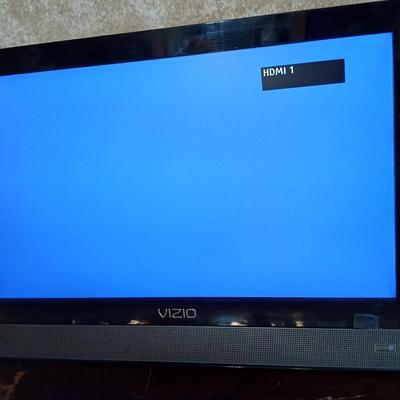 Working 19" Vizio Television with small media storage stand