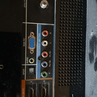 Working 19" Vizio Television with small media storage stand