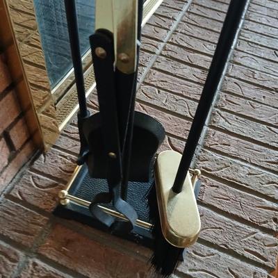 Gold handled Black iron Fireplace tool set with storage stand
