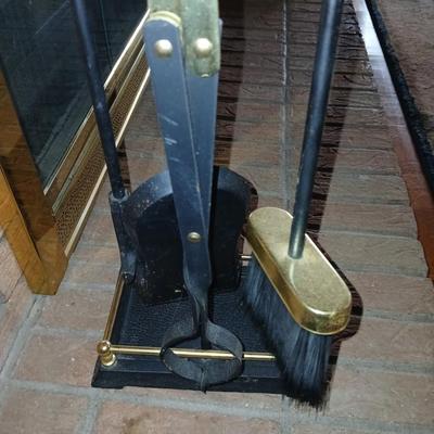 Gold handled Black iron Fireplace tool set with storage stand