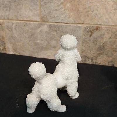Vintage JAPAN marked poodle figures and a little girl with a goose.