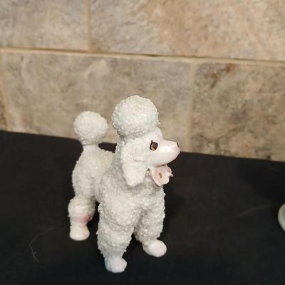Vintage JAPAN marked poodle figures and a little girl with a goose.