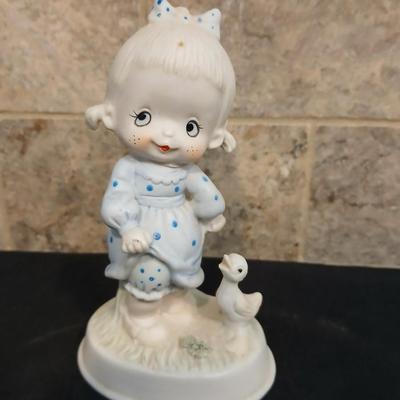 Vintage JAPAN marked poodle figures and a little girl with a goose.