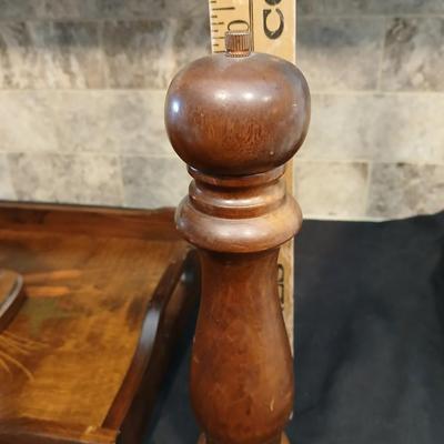 Vintage wood tray with wooden salt & pepper shakers and a wooden candle pillar
