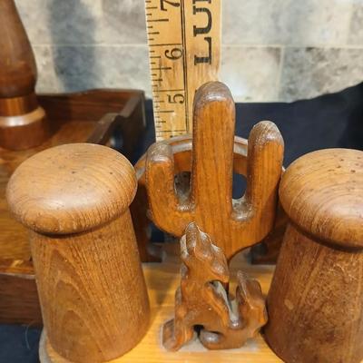 Vintage wood tray with wooden salt & pepper shakers and a wooden candle pillar