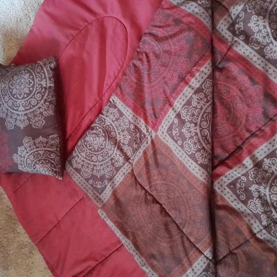 Blanket with throw pillow