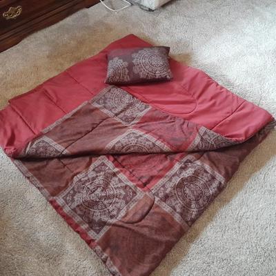 Blanket with throw pillow