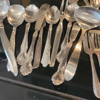 Silverware, coasters, silver clothes
