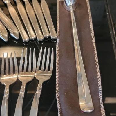 Silverware, coasters, silver clothes