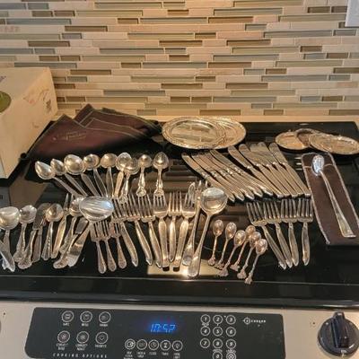 Silverware, coasters, silver clothes
