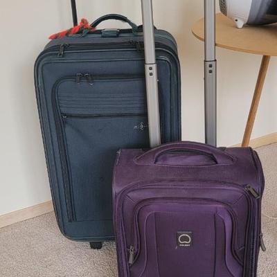 Luggage, cordless vac, table