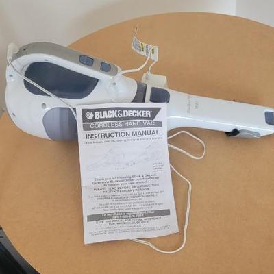 Luggage, cordless vac, table