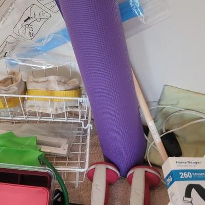 Weights, yoga mat, storage