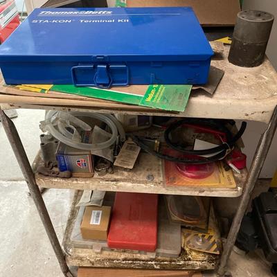 Metal cart with items