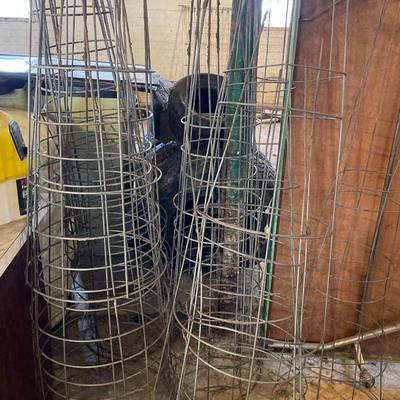 Many metal plant cages