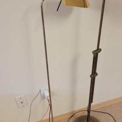 Two brass color floor lamps