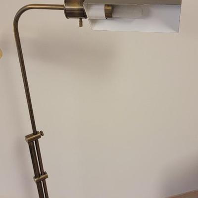 Two brass color floor lamps