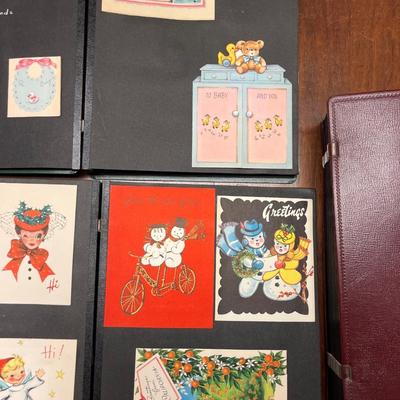 3 vintage scrapbooks with various cards